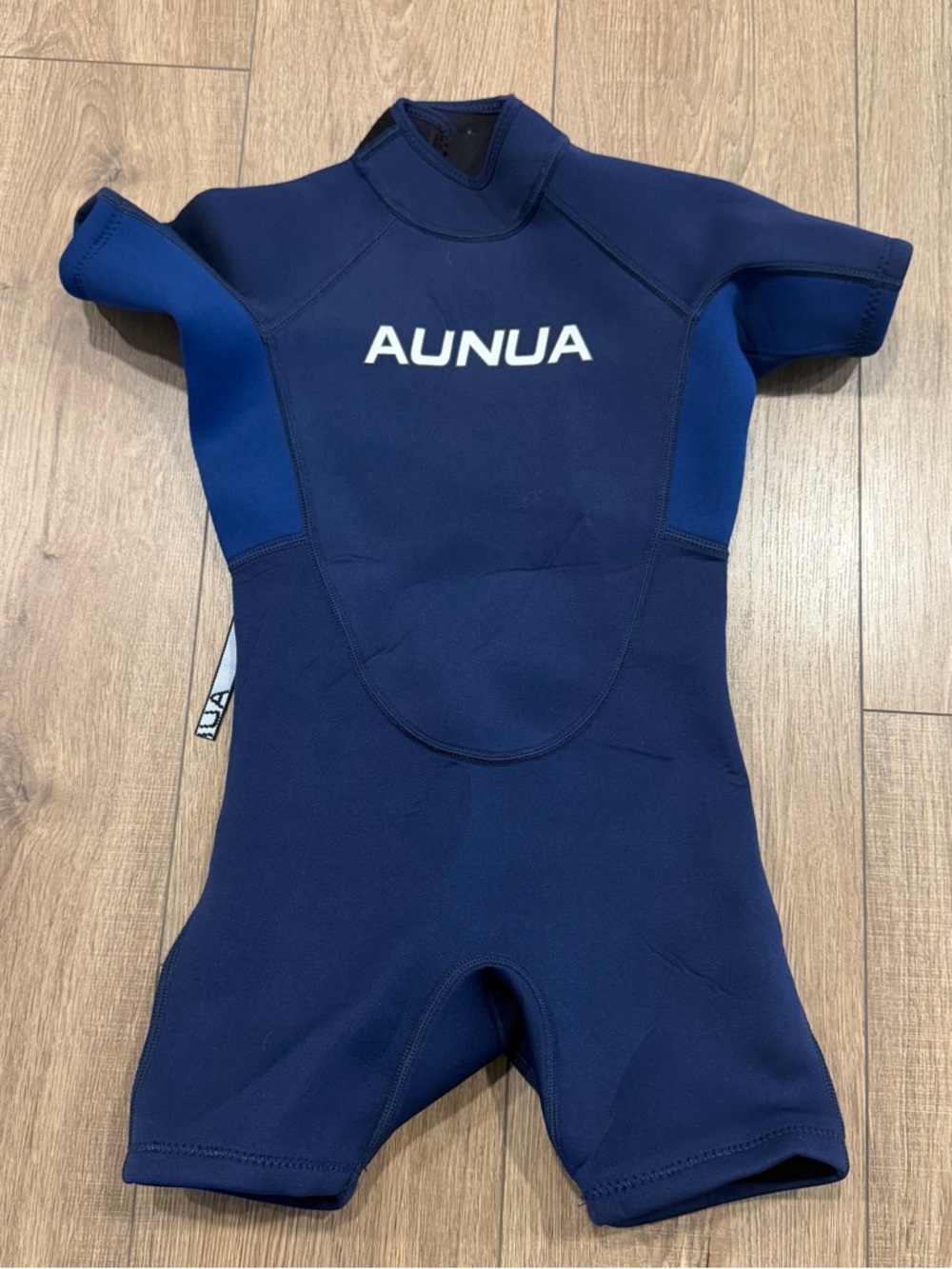 Kids' Wetsuit - Navy Blue, Aunua brand , size 8 y old